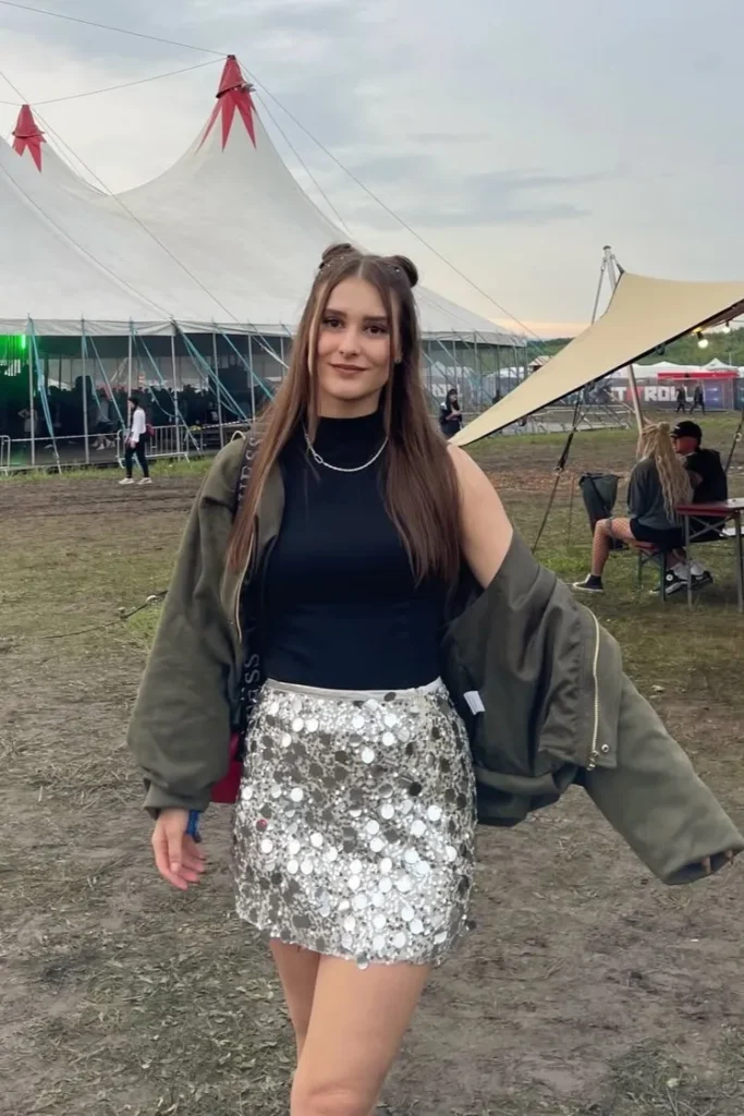 Black Sleeveless Top with Silver Sequin Mini Skirt and Olive Jacket