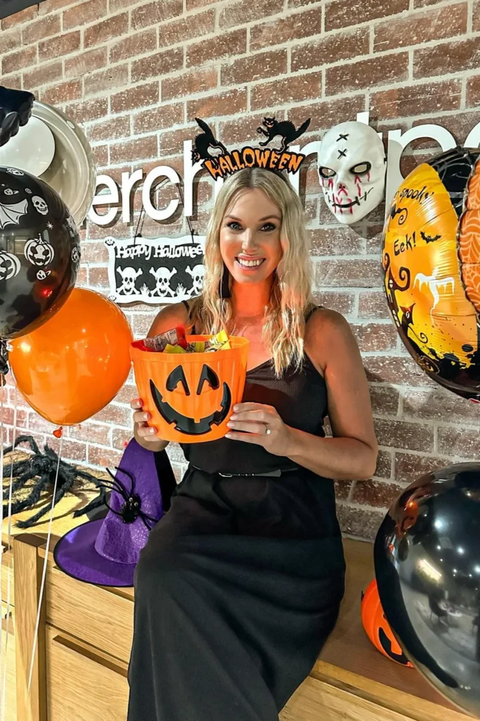 11. Black Sleeveless Dress with Halloween Headband