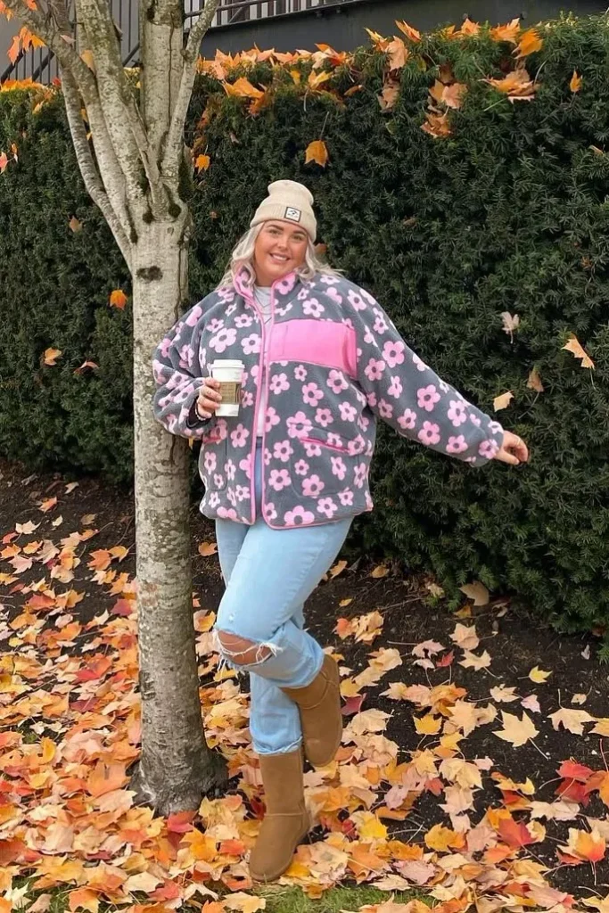 11. Pink Floral Fleece Jacket with Light Blue Ripped Jeans