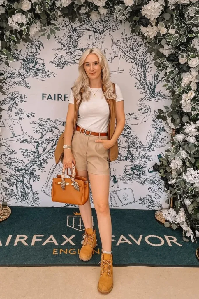 White Tee with Beige Shorts, Sleeveless Vest and Tan Boots