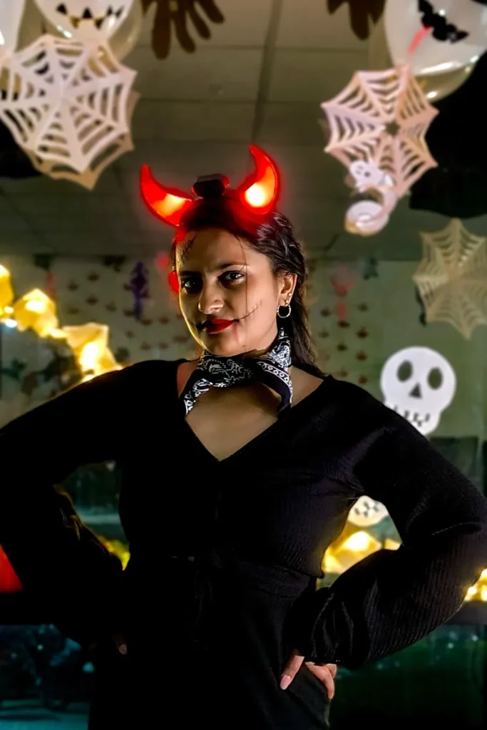 12. Black Cutout Dress with Red Devil Horns and Bandana Scarf