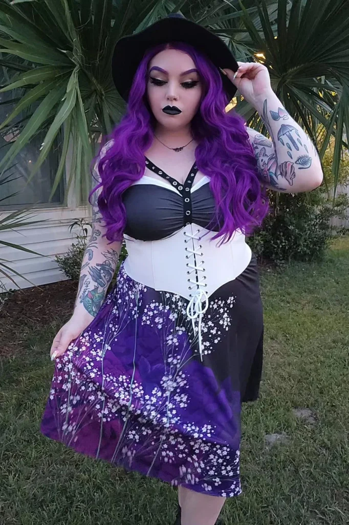 Black and Purple Dress with White Corset Belt and Black Hat