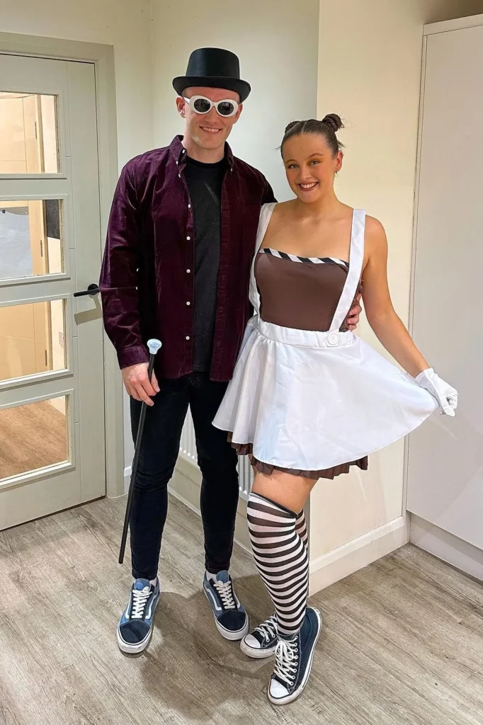 Burgundy Shirt with Black Jeans and Brown Dress with White Apron