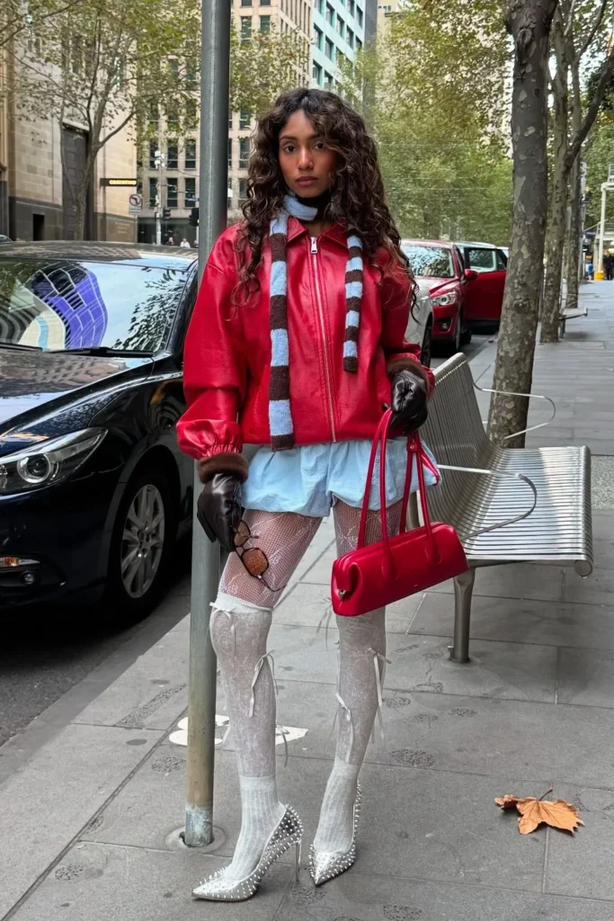 Red Leather Jacket with Blue Shorts and Studded Heels