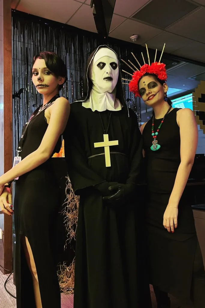16. Black Sleeveless Dress with Nun Costume and Black Dress with Red Flower Crown