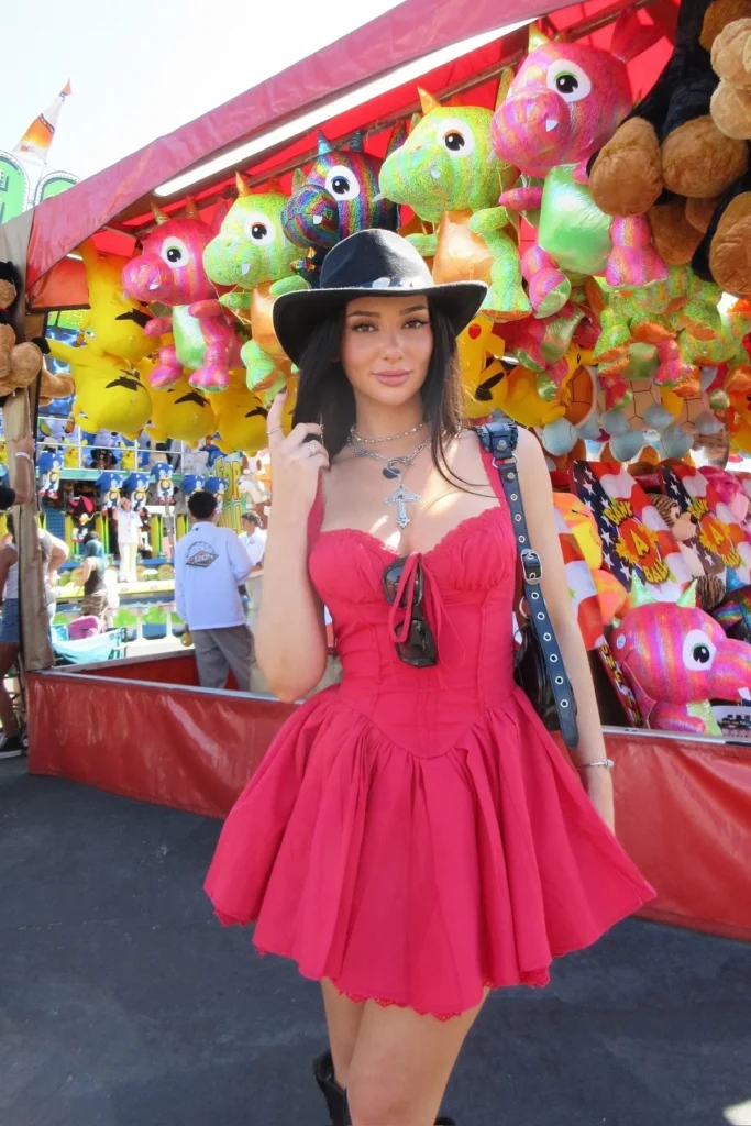Red Corset Mini Dress with a Black Cowboy Hat and Boots