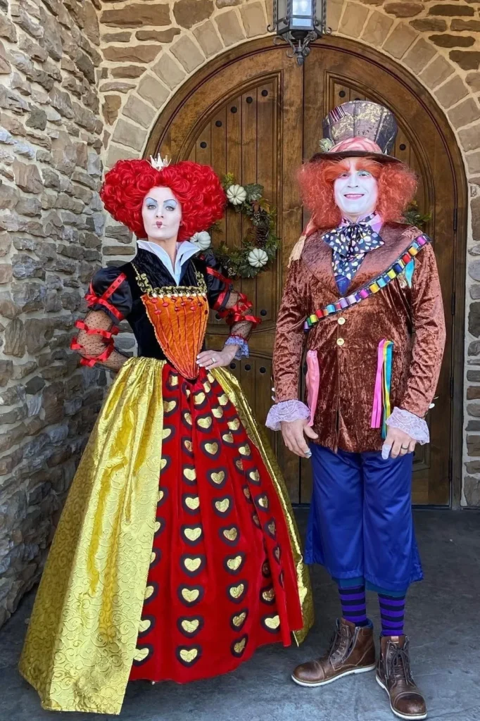 Red and Gold Gown with Brown Velvet Jacket and Blue Trousers