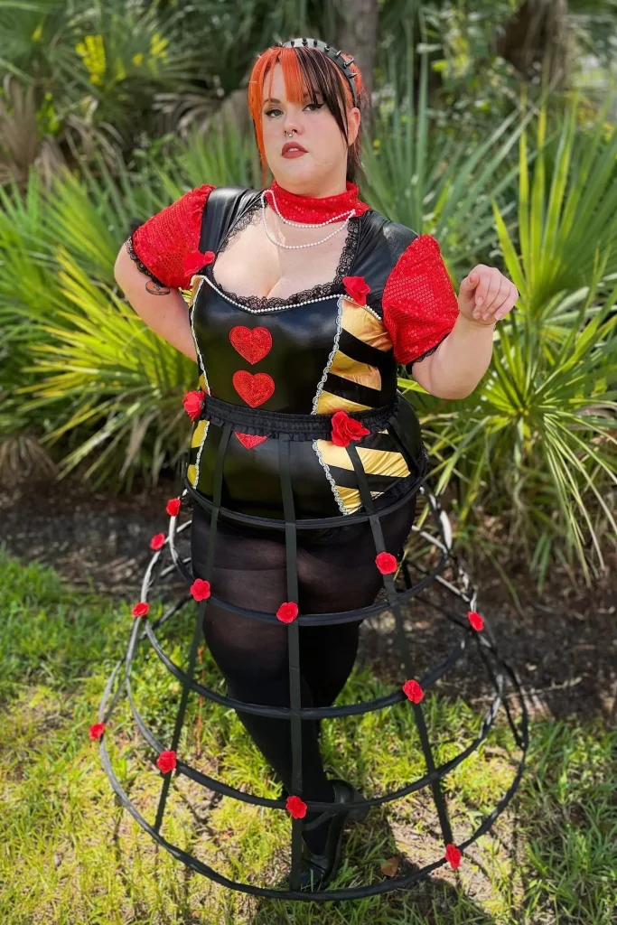 Black and Red Heart Detail Dress with Sequin Sleeves and Cage Skirt
