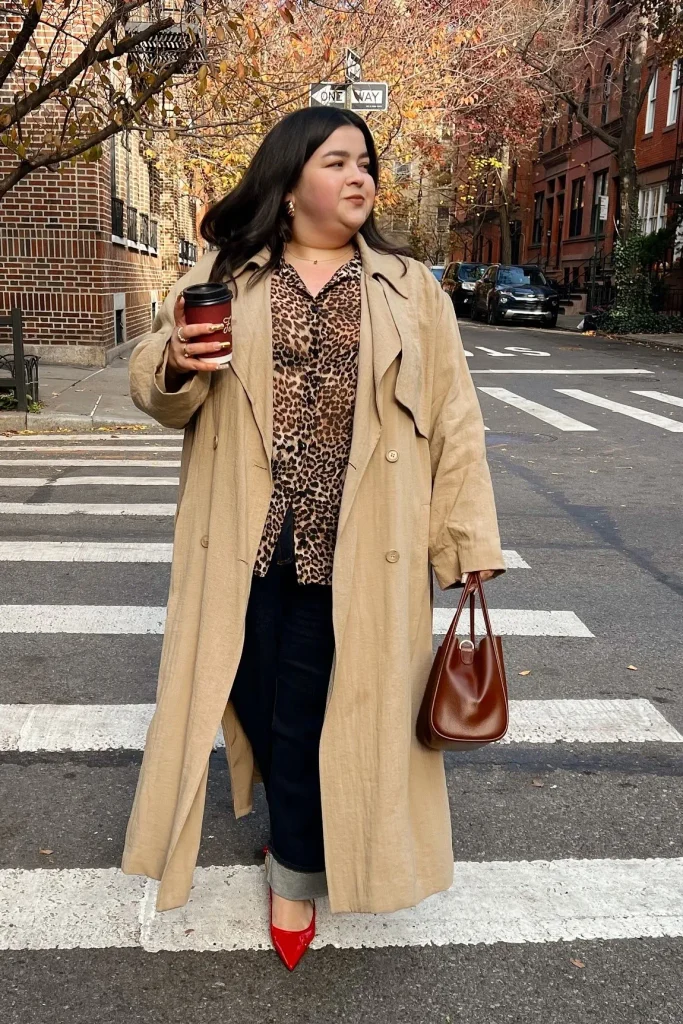 2. Beige Trench Coat with Leopard Print Blouse and Dark Jeans