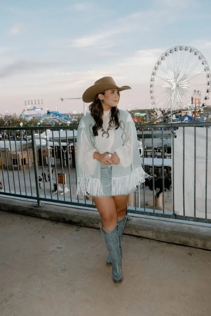 White Blouse with Blue Fringe Vest and Denim Shorts