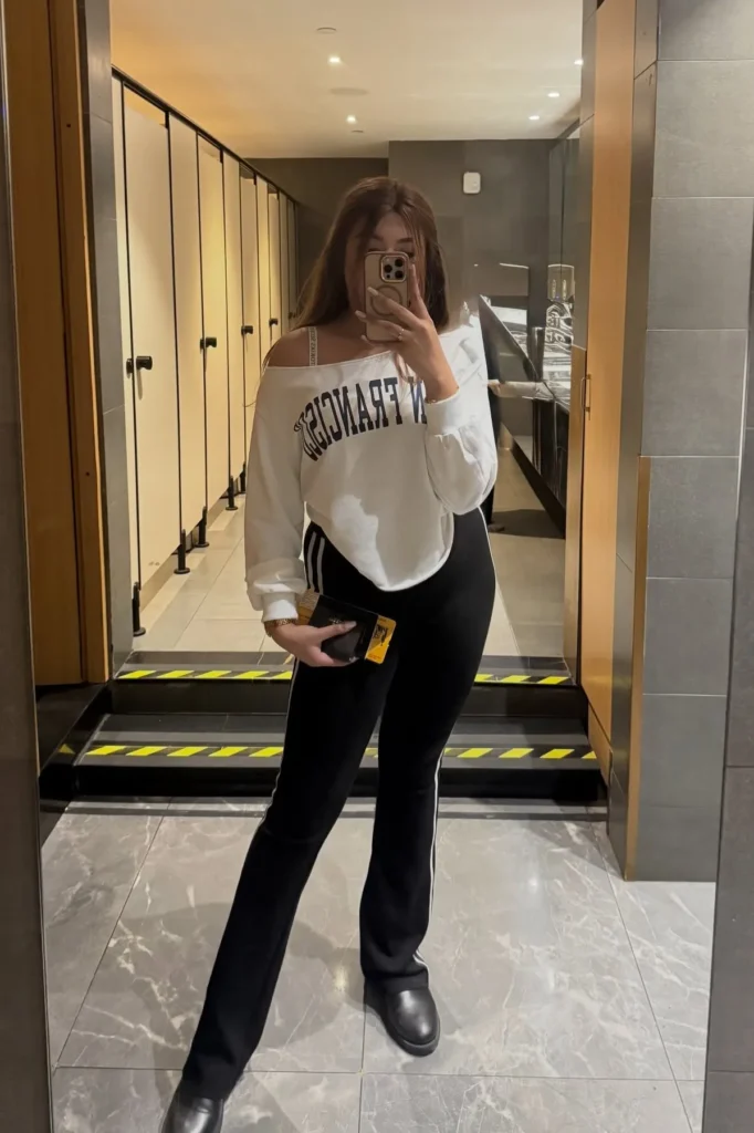 White Off-Shoulder Sweatshirt with Black Flare Pants