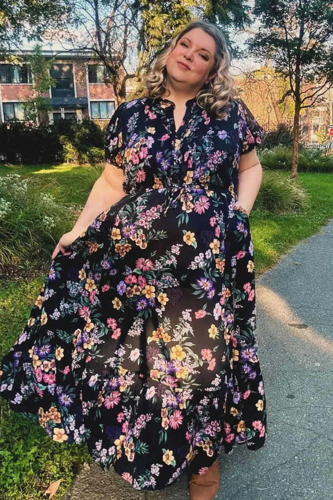 5. Black Floral Midi Dress with Brown Ankle Boots