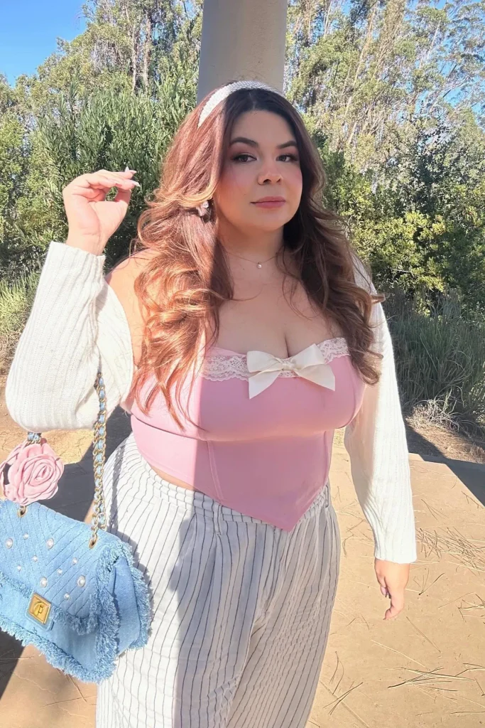 7. Pink Bow Corset Top with White Cardigan and White Pinstripe Pants