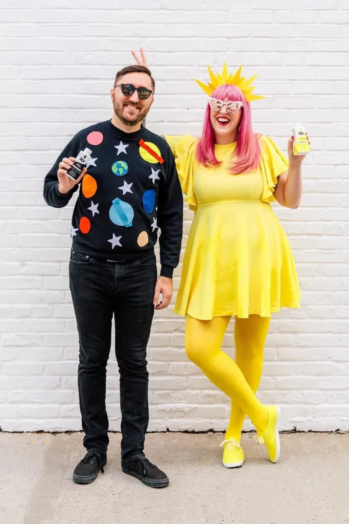 8. Black Planet Sweatshirt with Jeans and Yellow Dress with Tights