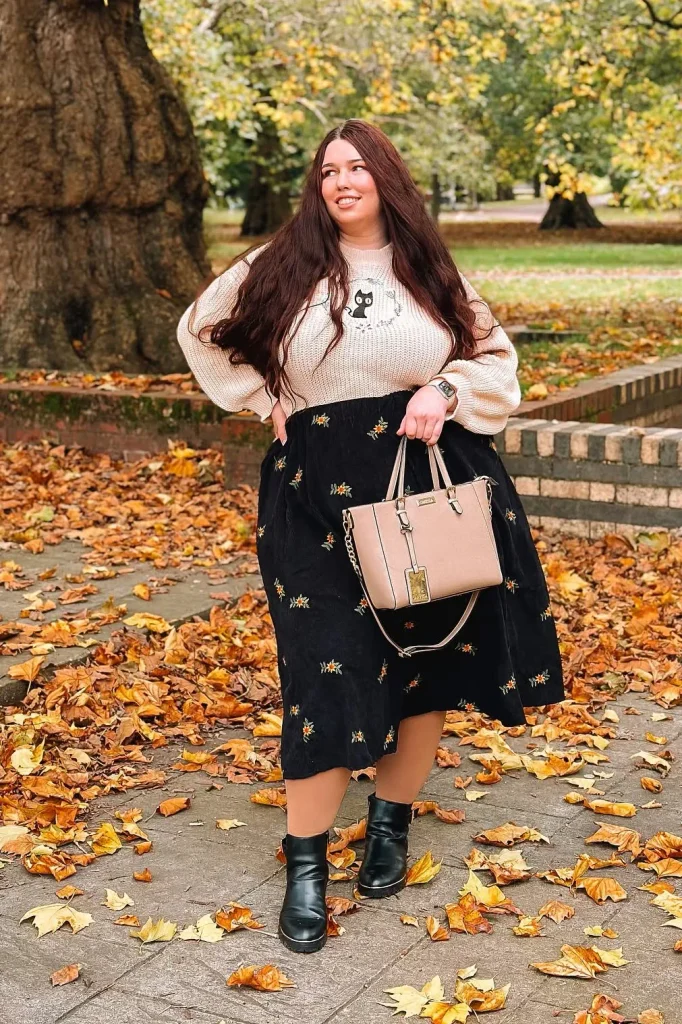 8. Cream Knit Sweater with Black Embroidered Midi Skirt and Black Ankle Boots